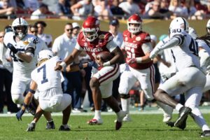 Business-like Hogs down Lions with running game