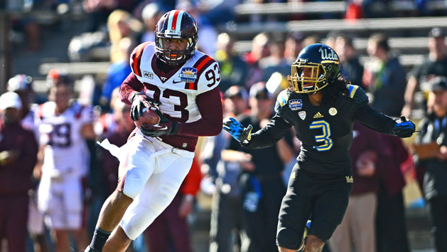 Kalvin Cline (93) makes a catch and gets away from UCLA Bruins safety Randall Goforth (3) during the first quarter in the 2013 Sun Bowl at Sun Bowl Stadium. Photo Credit: Andrew Weber-USA TODAY Sports