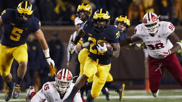 Nov 17, 2018; Ann Arbor, MI, USA; Michigan Wolverines running back Karan Higdon (22) rushes past Indiana Hoosiers linebacker T.D. Roof (45) in the second half at Michigan Stadium. Photo Credit: Rick Osentoski-USA TODAY Sports
