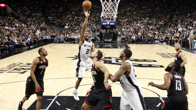 May 3, 2017; San Antonio, TX, USA; San Antonio Spurs small forward Kawhi Leonard (2) puts up a shot over Houston Rockets power forward Ryan Anderson (3) during the second half in game two of the second round of the 2017 NBA Playoffs at AT&T Center. Mandatory Credit: Soobum Im-USA TODAY Sports