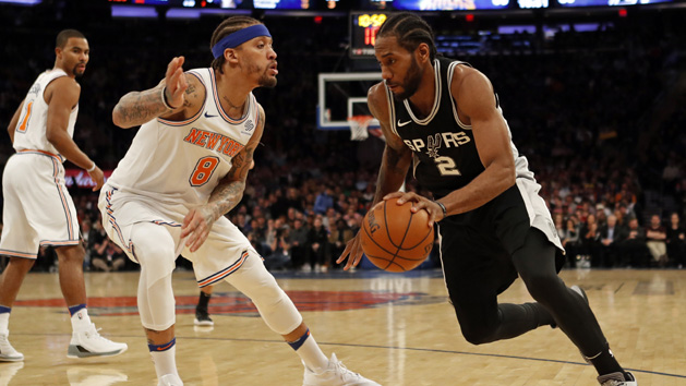Jan 2, 2018; New York, NY, USA; San Antonio Spurs forward Kawhi Leonard (2) drives to the basket past New York Knicks forward Michael Beasley (8) during the second half at Madison Square Garden. Photo Credit: Adam Hunger-USA TODAY Sports