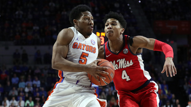 Jan 30, 2019; Gainesville, FL, USA; Florida Gators guard KeVaughn Allen (5) drives to the basket for a layup against Mississippi Rebels guard Breein Tyree (4) during overtime at Exactech Arena. Photo Credit: Kim Klement-USA TODAY Sports