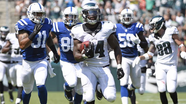 Kenjon Barner (34) scores a touchdown on a 94-yard punt return during the second quarter against the Indianapolis Colts in a preseason NFL football game at Lincoln Financial Field. (Eric Hartline-USA TODAY Sports)