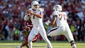 Behind Hill’s school-record passing, Aggies roll