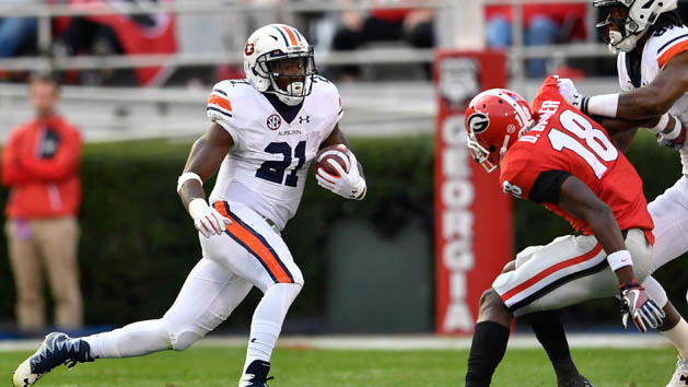 Nov 12, 2016; Athens, GA, USA; Auburn Tigers running back Kerryon Johnson (21) runs past Georgia Bulldogs cornerback Deandre Baker (18) during the second quarter at Sanford Stadium. Photo Credit: Dale Zanine-USA TODAY Sports