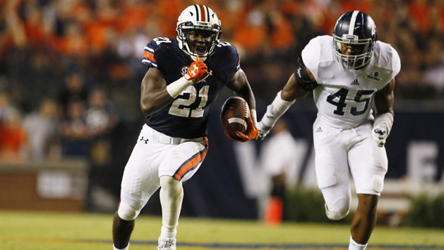 Sep 2, 2017; Auburn, AL, USA; Auburn Tigers running back Kerryon Johnson (21) runs past Georgia Southern Eagles defenders during the second quarter at Jordan-Hare Stadium. Photo Credit: John Reed-USA TODAY Sports