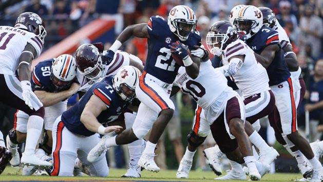 Sep 30, 2017; Auburn, AL, USA; Auburn Tigers running back Kerryon Johnson (21) carries on a 60-yard run against the Mississippi State Bulldogs during the first quarter at Jordan-Hare Stadium. Photo Credit: John Reed-USA TODAY Sports