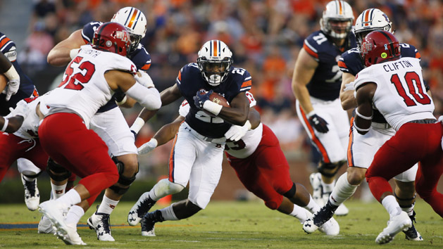 Sep 10, 2016; Auburn, AL, USA; Auburn Tigers running back Kerryon Johnson (21) carries against the Arkansas State Red Wolves during the first half at Jordan Hare Stadium. Photo Credit: John Reed-USA TODAY Sports