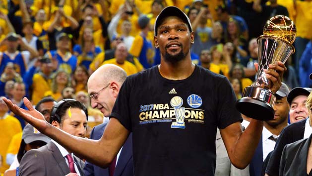 Jun 12, 2017; Oakland, CA, USA; Golden State Warriors forward Kevin Durant (35) celebrates after winning the NBA Fianls MVP in game five of the 2017 NBA Finals at Oracle Arena. Photo Credit: Kelley L Cox-USA TODAY Sports
