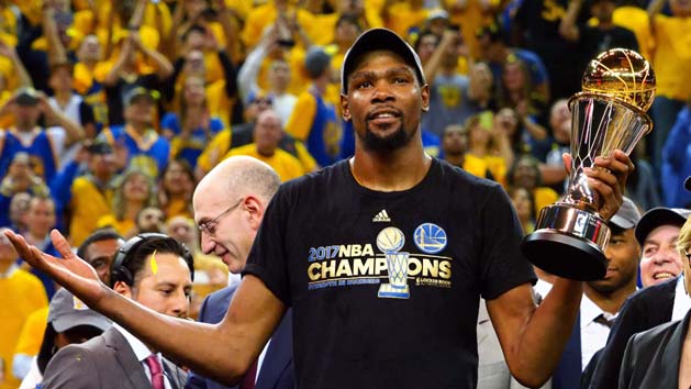 Jun 12, 2017; Oakland, CA, USA; Golden State Warriors forward Kevin Durant (35) celebrates after winning the NBA Fianls MVP in game five of the 2017 NBA Finals at Oracle Arena. Photo Credit: Kelley L Cox-USA TODAY Sports