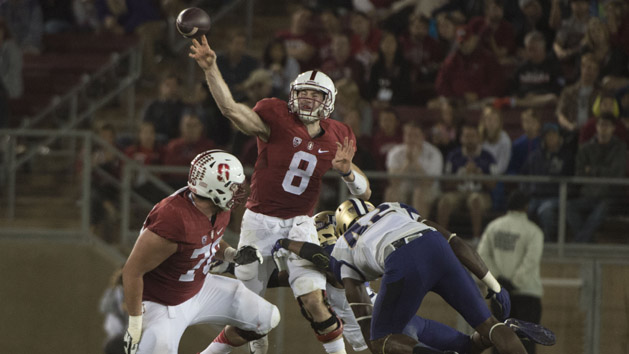 October 24, 2015; Stanford, CA, USA; Stanford Cardinal quarterback Kevin Hogan (8) passes the football against Washington Huskies linebacker Cory Littleton (42) during the third quarter at Stanford Stadium. The Cardinal defeated the Huskies 31-14. Mandatory Credit: Kyle Terada-USA TODAY Sports