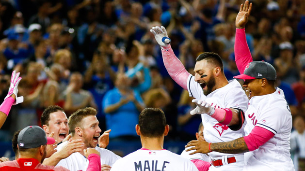 May 14, 2017; Toronto, Ontario, CAN; Toronto Blue Jays center fielder Kevin Pillar (11) celebrates with teammates after hitting a walk off home run against the Seattle Mariners during the ninth inning at Rogers Centre. Photo Credit: Kevin Sousa-USA TODAY Sports