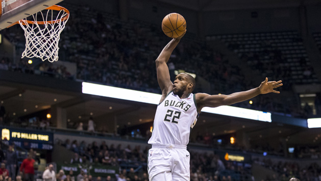 Feb 15, 2018; Milwaukee, WI, USA; Milwaukee Bucks forward Khris Middleton (22) dunks during the third quarter against the Denver Nuggets at BMO Harris Bradley Center. Photo Credit: Jeff Hanisch-USA TODAY Sports