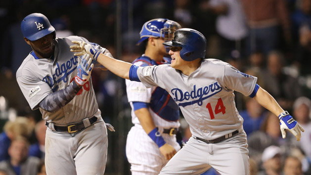 Oct 19, 2017; Chicago, IL, USA; Los Angeles Dodgers outfielder Enrique Hernandez (14) celebrates with right fielder Yasiel Puig (left) after hitting a two-run home run against the Chicago Cubs in the 9th inning in game five of the 2017 NLCS playoff baseball series at Wrigley Field. Photo Credit: Dennis Wierzbicki-USA TODAY Sports