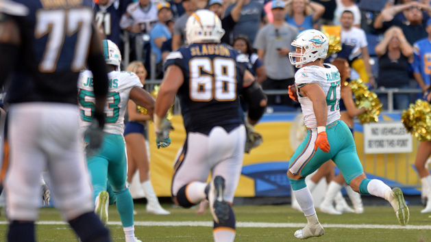 Nov 13, 2016; San Diego, CA, USA; Miami Dolphins middle linebacker Kiko Alonso (47) runs back an interception for a touchdown during the fourth quarter against the San Diego Chargers at Qualcomm Stadium. Photo Credit: Jake Roth-USA TODAY Sports