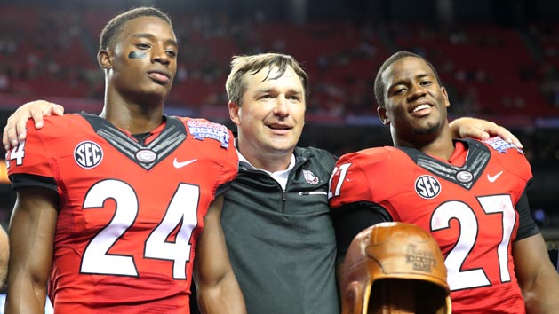 Sep 3, 2016; Atlanta, GA, USA; Georgia Bulldogs head coach Kirby Smart celebrates with safety Dominick Sanders (24) and running back Nick Chubb (27) after the 2016 Chick-Fil-A Kickoff game against the North Carolina Tar Heels at Georgia Dome. Georgia won 33-24. Photo Credit: Jason Getz-USA TODAY Sports