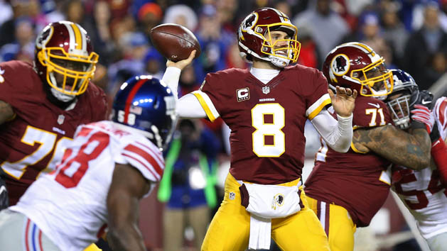 Jan 1, 2017; Landover, MD, USA; Washington Redskins quarterback Kirk Cousins (8) throws the ball as New York Giants defensive end Owa Odighizuwa (58) chases in the third quarter at FedEx Field. The Giants won 19-10. Photo Credit: Geoff Burke-USA TODAY Sports