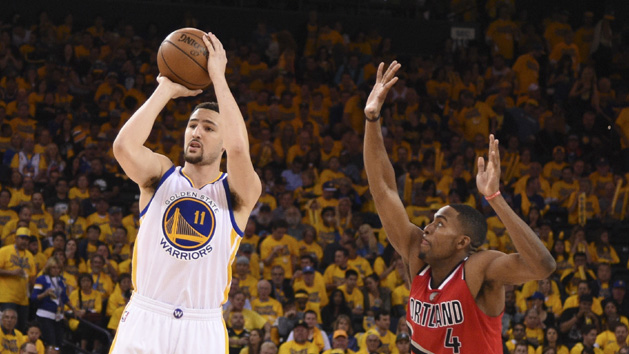 May 11, 2016; Oakland, CA, USA; Golden State Warriors guard Klay Thompson (11) shoots the basketball against Portland Trail Blazers forward Maurice Harkless (4) during the third quarter in game five of the second round of the NBA Playoffs at Oracle Arena. The Warriors defeated the Trail Blazers 125-121. Mandatory Credit: Kyle Terada-USA TODAY Sports