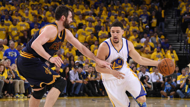 June 2, 2016; Oakland, CA, USA; Golden State Warriors guard Klay Thompson (11) moves the ball against Cleveland Cavaliers forward Kevin Love (0) during the second half in game one of the NBA Finals at Oracle Arena. Photo Credit: Kyle Terada-USA TODAY Sports