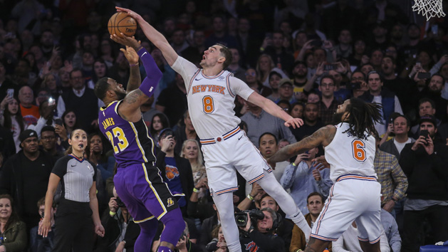 Mar 17, 2019; New York, NY, USA; New York Knicks forward Mario Hezonja (8) blocks Los Angeles Lakers forward LeBron James (23) shot at the buzzer in the Knicks 124-123 victory at Madison Square Garden. Photo Credit: Wendell Cruz-USA TODAY Sports