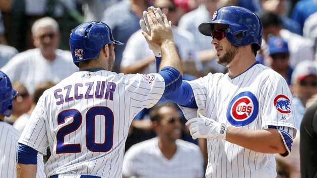 Aug 18, 2016; Chicago, IL, USA; Chicago Cubs third baseman Kris Bryant (right) celebrates with left fielder Matt Szczur (20) after hitting two-run home run off of Milwaukee Brewers starting pitcher Zach Davies (not pictured) during the third inning at Wrigley Field. Photo Credit: Kamil Krzaczynski-USA TODAY Sports