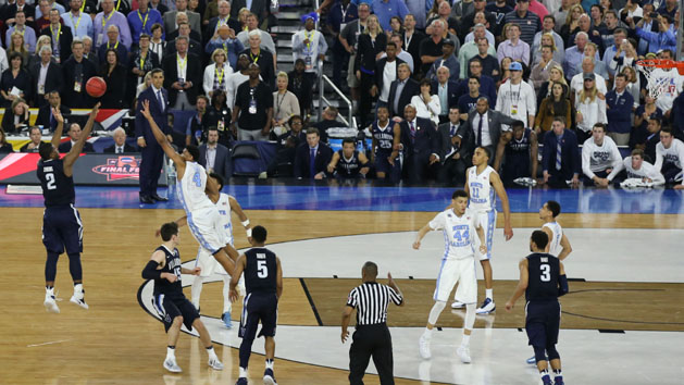Apr 4, 2016; Houston, TX, USA; Villanova Wildcats forward Kris Jenkins (2) shoots the game-wining shot over North Carolina Tar Heels forward Isaiah Hicks (4) in the championship game of the 2016 NCAA Men's Final Four at NRG Stadium. Villanova won 77-74. Mandatory Credit: Troy Taormina-USA TODAY Sports