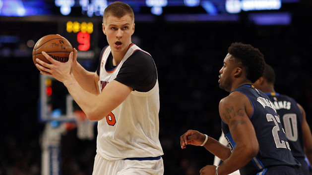 Nov 14, 2016; New York, NY, USA; New York Knicks forward Kristaps Porzingis (6) looks to pass around Dallas Mavericks guard Wesley Matthews (23) during the second half at Madison Square Garden. Photo Credit: Adam Hunger-USA TODAY Sports