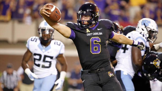 Sep 20, 2014; Greenville, NC, USA; East Carolina Pirates quarterback Kurt Benkert (6) goes in for a touchdown run against the North Carolina Tar Heels during the 4th quarter at Dowdy-Ficklen Stadium. The East Carolina Pirates defeated the North Carolina Tar Heels 70-41. Mandatory Credit: James Guillory-USA TODAY Sports