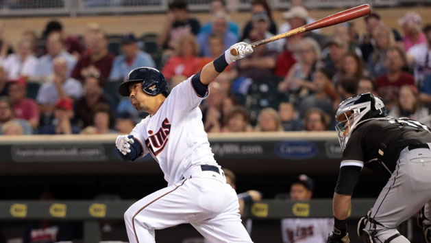 Sep 1, 2016; Minneapolis, MN, USA; Minnesota Twins catcher Kurt Suzuki (8) hits a RBI single during the second inning against the Chicago White Sox at Target Field. Photo Credit: Jordan Johnson-USA TODAY Sports