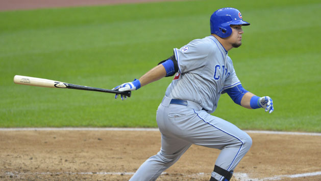 Jun 17, 2015; Cleveland, OH, USA; Chicago Cubs designated hitter Kyle Schwarber (12) hits an RBI single in the third inning against the Cleveland Indians at Progressive Field. David Richard-USA TODAY Sports