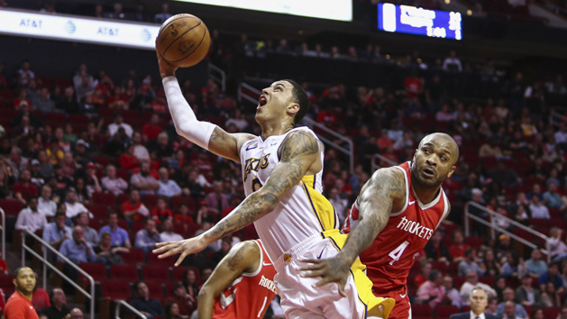 Dec 20, 2017; Houston, TX, USA; Los Angeles Lakers forward Kyle Kuzma (0) shoots against Houston Rockets forward PJ Tucker (4) during the third quarter against the Houston Rockets at Toyota Center. Photo Credit: Troy Taormina-USA TODAY Sports