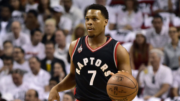 May 7, 2016; Miami, FL, USA; Toronto Raptors guard Kyle Lowry (7) dribbles the ball against the Miami Heat during the first quarter in game three of the second round of the NBA Playoffs at American Airlines Arena. Mandatory Credit: Steve Mitchell-USA TODAY Sports