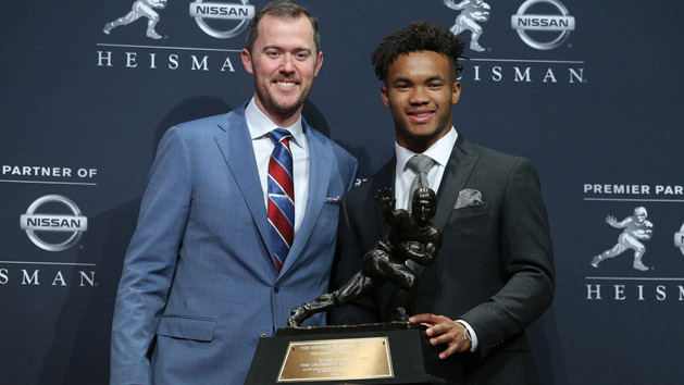 Dec 8, 2018; New York, NY, USA; Oklahoma Sooners quarterback Kyler Murray (right) poses for photos with head coach Lincoln Riley (left) during a press conference at the New York Marriott Marquis after winning the Heisman Trophy. Mandatory Credit: Brad Penner-USA TODAY Sports