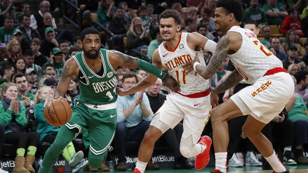 Mar 16, 2019; Boston, MA, USA; Boston Celtics guard Kyrie Irving (11) drives past Atlanta Hawks guard Trae Young (11) during the second half at TD Garden. Photo Credit: Winslow Townson-USA TODAY Sports
