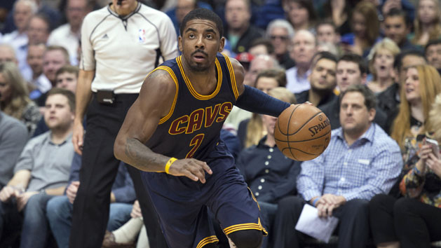 Jan 12, 2016; Dallas, TX, USA; Cleveland Cavaliers guard Kyrie Irving (2) dribbles the ball against the Dallas Mavericks during the second half at the American Airlines Center. The Cavaliers defeat the Mavericks 110-107 in overtime. Mandatory Credit: Jerome Miron-USA TODAY Sports