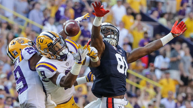 Oct 14, 2017; Baton Rouge, LA, USA; LSU Tigers cornerback Andraez Williams (29) and safety Grant Delpit (9) break up a pass to Auburn Tigers wide receiver Darius Slayton (81) during the second half of a game at Tiger Stadium. LSU defeated Auburn 27-23. Photo Credit: Derick E. Hingle-USA TODAY Sports