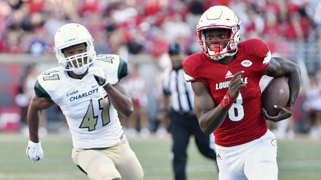 Sep 1, 2016; Louisville, KY, USA; Louisville Cardinals quarterback Lamar Jackson (8) runs the ball past Charlotte 49ers linebacker Carl Yonter (47) for a touchdown during the first quarter at Papa John's Cardinal Stadium. Photo Credit: Jamie Rhodes-USA TODAY Sports