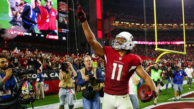 Jan 16, 2016; Glendale, AZ, USA; Arizona Cardinals wide receiver Larry Fitzgerald (11) celebrates after scoring the winning touchdown against the Green Bay Packers during overtime in a NFC Divisional round playoff game at University of Phoenix Stadium. Mandatory Credit: Mark J. Rebilas-USA TODAY Sports