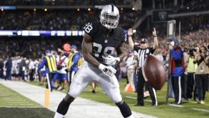 Murray scores 3 TDs as Raiders romp past Broncos