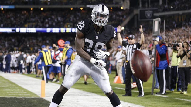 Nov 6, 2016; Oakland, CA, USA; Oakland Raiders running back Latavius Murray (28) reacts after scoring a touchdown, before having the play called back because of a penalty, during action against the Denver Broncos in the second quarter at Oakland Coliseum. Murray would go on to rush for a touchdown later in the drive. Photo Credit: Cary Edmondson-USA TODAY Sports