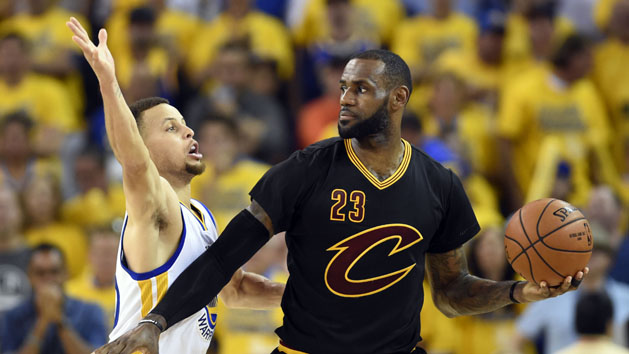 Jun 19, 2016; Oakland, CA, USA; Cleveland Cavaliers forward LeBron James (23) handles the ball against Golden State Warriors guard Stephen Curry (30) during the third quarter in game seven of the NBA Finals at Oracle Arena. Mandatory Credit: Bob Donnan-USA TODAY Sports
