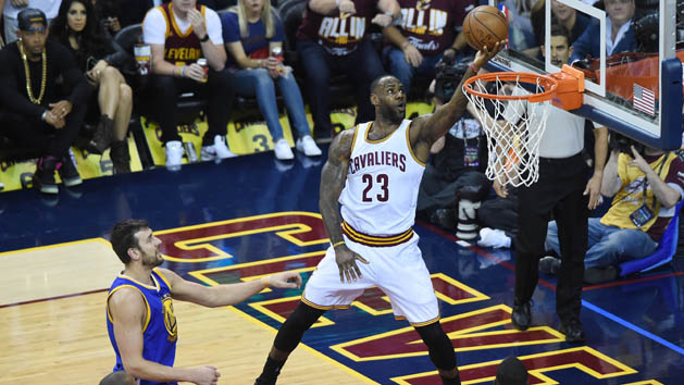 Jun 8, 2016; Cleveland, OH, USA; Cleveland Cavaliers forward LeBron James (23) shoots the ball in front of Golden State Warriors center Andrew Bogut (12) during the first quarter in game three of the NBA Finals at Quicken Loans Arena. Photo Credit: Ken Blaze-USA TODAY Sports
