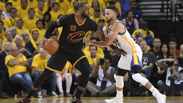 Jun 12, 2017; Oakland, CA, USA; Cleveland Cavaliers forward LeBron James (23) is defended by Golden State Warriors guard Stephen Curry (30) during the third quarter in game five of the 2017 NBA Finals at Oracle Arena. Photo Credit: Kyle Terada-USA TODAY Sports