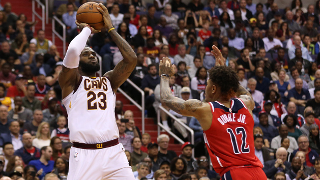 Nov 3, 2017; Washington, DC, USA; Cleveland Cavaliers forward LeBron James (23) shoots the ball over Washington Wizards forward Kelly Oubre Jr. (12) in the fourth quarter at Capital One Arena. The Cavaliers won 130-122. Photo Credit: Geoff Burke-USA TODAY Sports