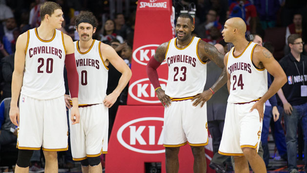 Nov 2, 2015; Philadelphia, PA, USA; Cleveland Cavaliers forward LeBron James (23) stands with his team after becoming the youngest player in NBA history to record 25,000 career points during the fourth quarter against the Philadelphia 76ers at Wells Fargo Center. The Cavaliers won 107-100. Mandatory Credit: Bill Streicher-USA TODAY Sports
