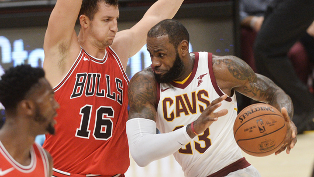 Oct 10, 2017; Cleveland, OH, USA; Cleveland Cavaliers forward LeBron James (23) drives to the basket against Chicago Bulls guard Paul Zipser (16) during the first half at Quicken Loans Arena. Photo Credit: Ken Blaze-USA TODAY Sports