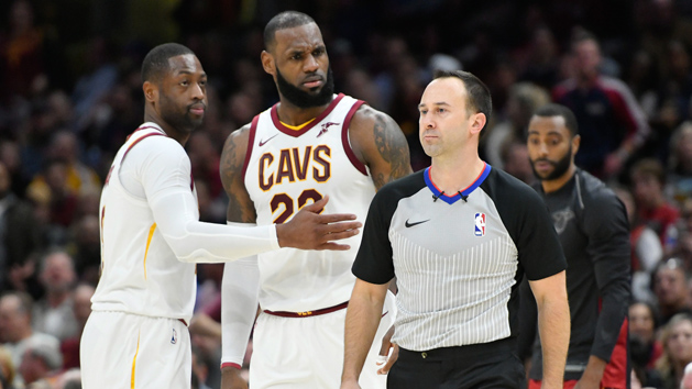 Nov 28, 2017; Cleveland, OH, USA; Cleveland Cavaliers forward LeBron James (23) reacts with Dwyane Wade (9) after he was ejected by referee Kane Fitzgerald (5) in the third quarter against the Miami Heat at Quicken Loans Arena. Photo Credit: David Richard-USA TODAY Sports