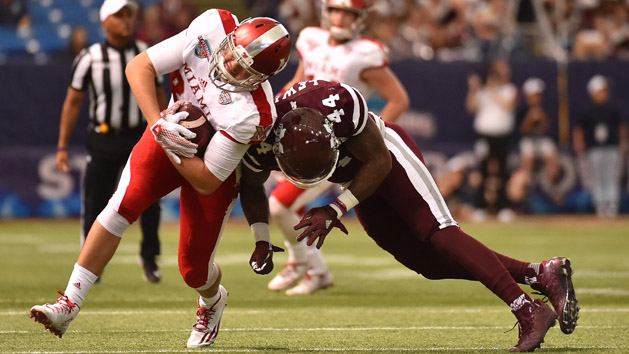 Dec 26, 2016; St. Petersburg, FL, USA; Mississippi State Bulldogs linebacker Leo Lewis (44) brings down Miami Redhawks wide receiver James Gardner (81) during the first half at Tropicana Field. Photo Credit: Jasen Vinlove-USA TODAY Sports