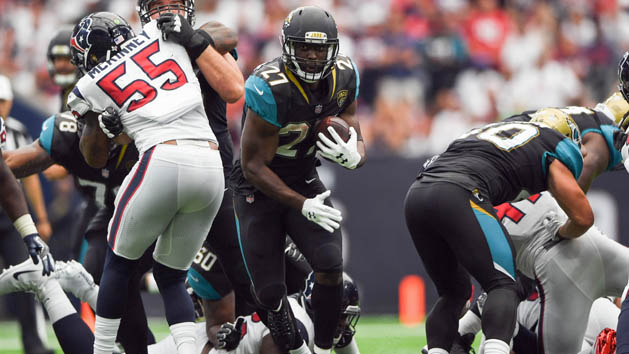 Sep 10, 2017; Houston, TX, USA; Jacksonville Jaguars running back Leonard Fournette (27) runs the ball around Houston Texans defense during the third quarter at NRG Stadium. Photo Credit: Shanna Lockwood-USA TODAY Sports