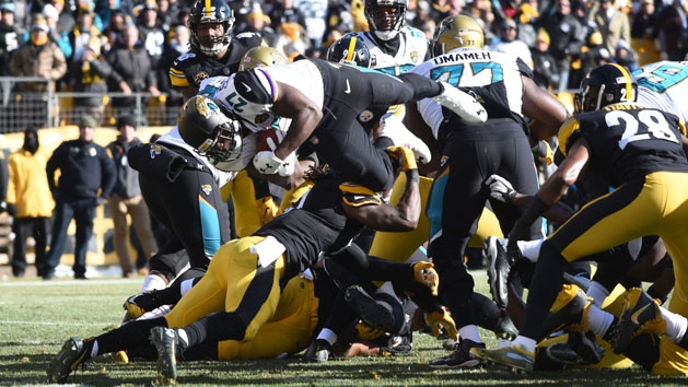 Jan 14, 2018; Pittsburgh, PA, USA; Jacksonville Jaguars running back Leonard Fournette (27) scores a touchdown during the first quarter in the AFC Divisional Playoff game against the Pittsburgh Steelers at Heinz Field. Photo Credit: Philip G. Pavely-USA TODAY Sports
